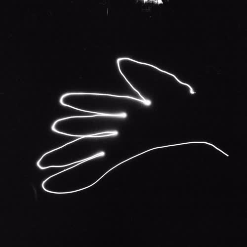 <body>
<p>This work proposes a vocabulary of single gestures traced in darkness with a handheld laser — each drawn in a single, uncorrectable movement. The line records the instant of approach, hesitation, or acknowledgment: fleeting encounters that shape our coexistence with others. These gestures parallel those unspoken exchanges that pass between strangers—allowing eye contact, offering a brief smile, a nod of recognition before the flow of daily life resumes.</p>
<p>In darkness, each gesture becomes both declaration and question. Without sight of its beginning or end, I must act in trust, as in any encounter with the unknown. The drawn light is an attempt to reach toward another, to speak without words, to register an instant of openness. The resulting traces form a fragile lexicon of recognition: arcs of invitation, lines of withdrawal, brief crossings that never fuse.</p>
<p>Philosophically, the project draws on Levinas’s insistence that ethics begins in the face-to-face meeting, before speech or comprehension, and on Han Byung-Chul’s reflections on the erosion of genuine contact in digital culture. These drawings seek to restore that lost friction — to offer illumination not as mastery, but as empathy, each gesture a visible echo of the courage to meet another in passing.
</p>
</body>
 Images Copyright Aldobranti® ©2008-'2025. All rights reserved.